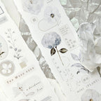 Set of decorative stickers with floral designs on a white background