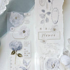 Stationery set with floral designs and text on a white background
