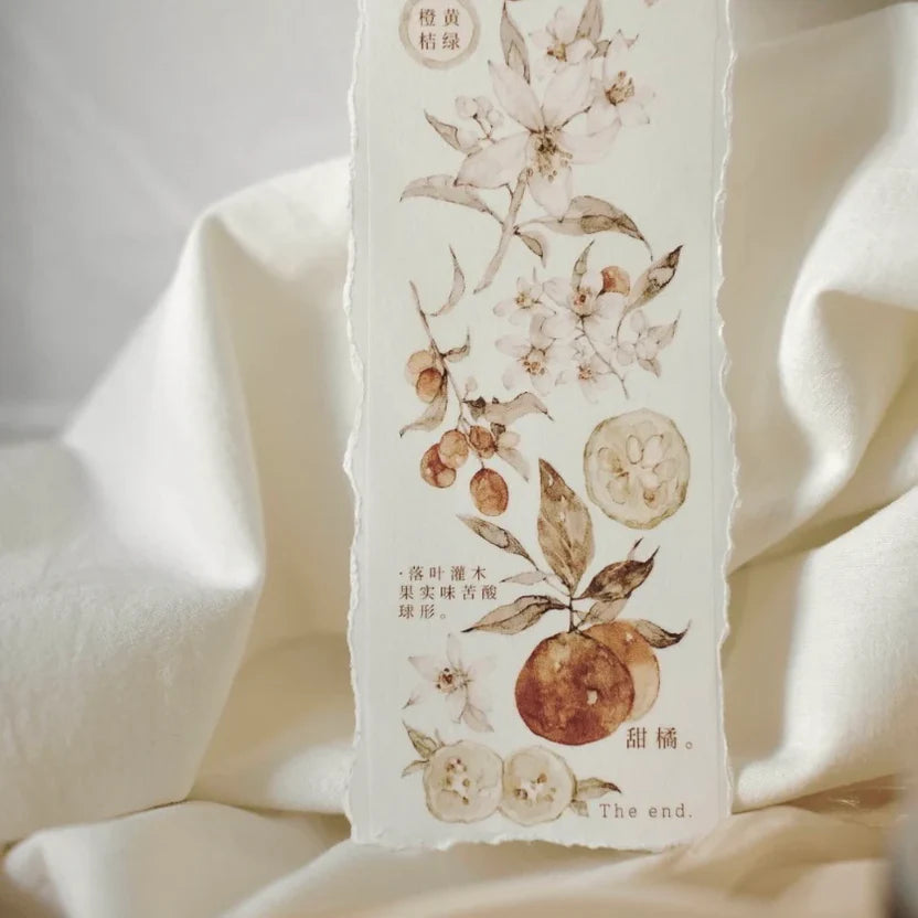 Freckles Tea Vol.3 Citrus Washi Tape packaging with floral and fruit design on soft white fabric