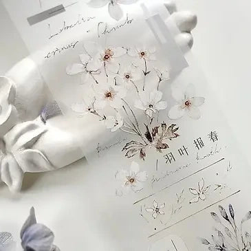 Plain White PET Tape delicate blooms with gold accents on a clean, bright background