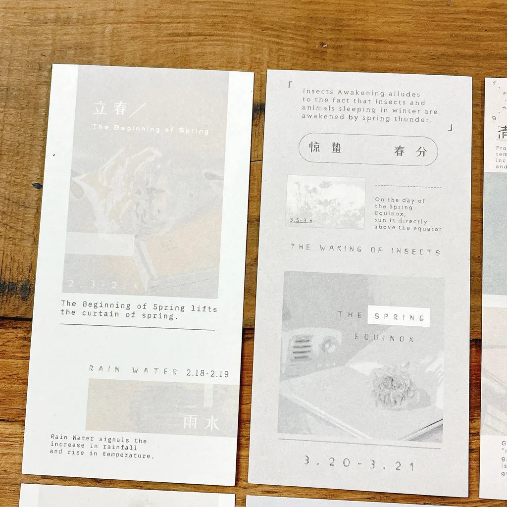 Solar Terms Memo Pad Vol. 3 white cards with text and minimal graphics on wood, top view