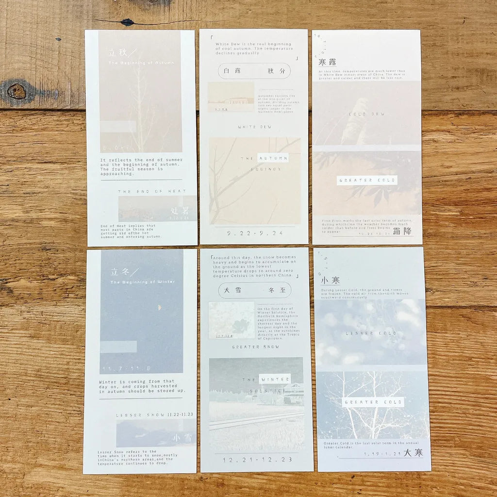 Six Solar Terms Memo Pad Vol. 3 cards with text and minimal designs on a wooden surface
