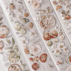 Set of floral and botanical stickers on a light gray background