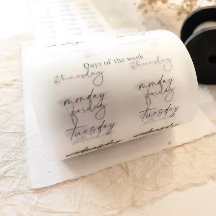 Roll of Functional Vol. 1 PET Tape printed with days of the week on a textured surface