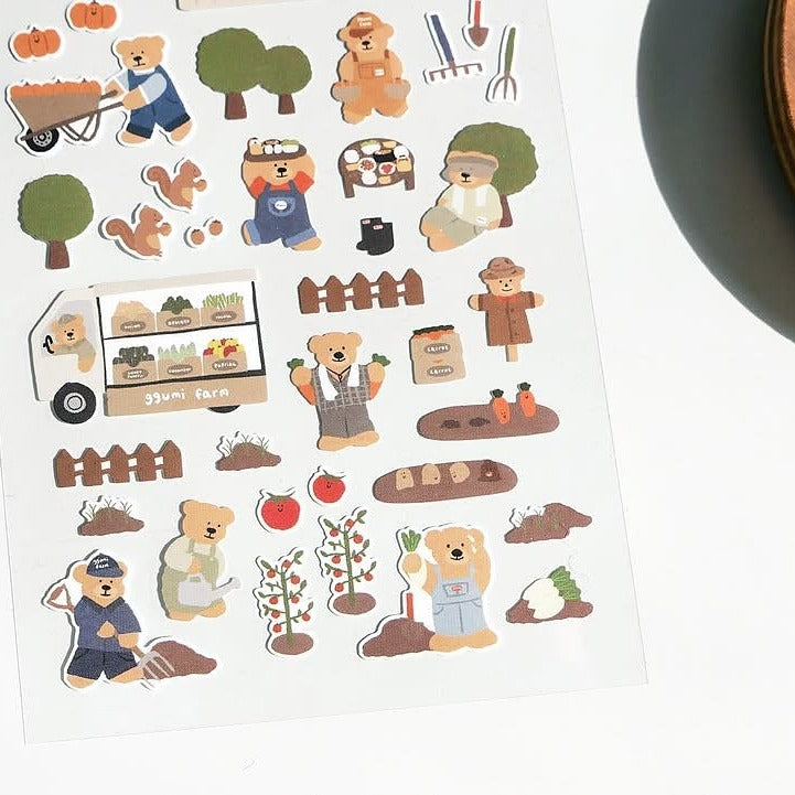 Stickers of cartoon bears and farm items on a white background, from the Ggumi Farm Sticker Sheet