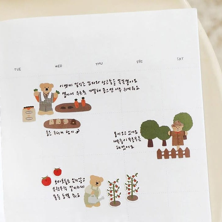 Weekly planner with cartoon illustrations of a teddy bear and text on a white background