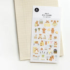 Sheet of decorative stickers with teddy bears and other illustrations on a white background