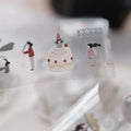 Sticker with a birthday cake and people design on a white background