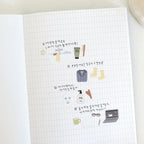 Notebook page with illustrations and text on a white background