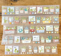 Set of decorative stickers with cactus designs on a wooden surface