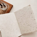 Close-up of a textured ceramic tile on a light surface