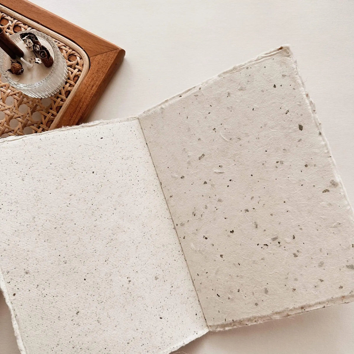 Close-up of the Handmade Paper A6 Notebook page texture on a light studio surface