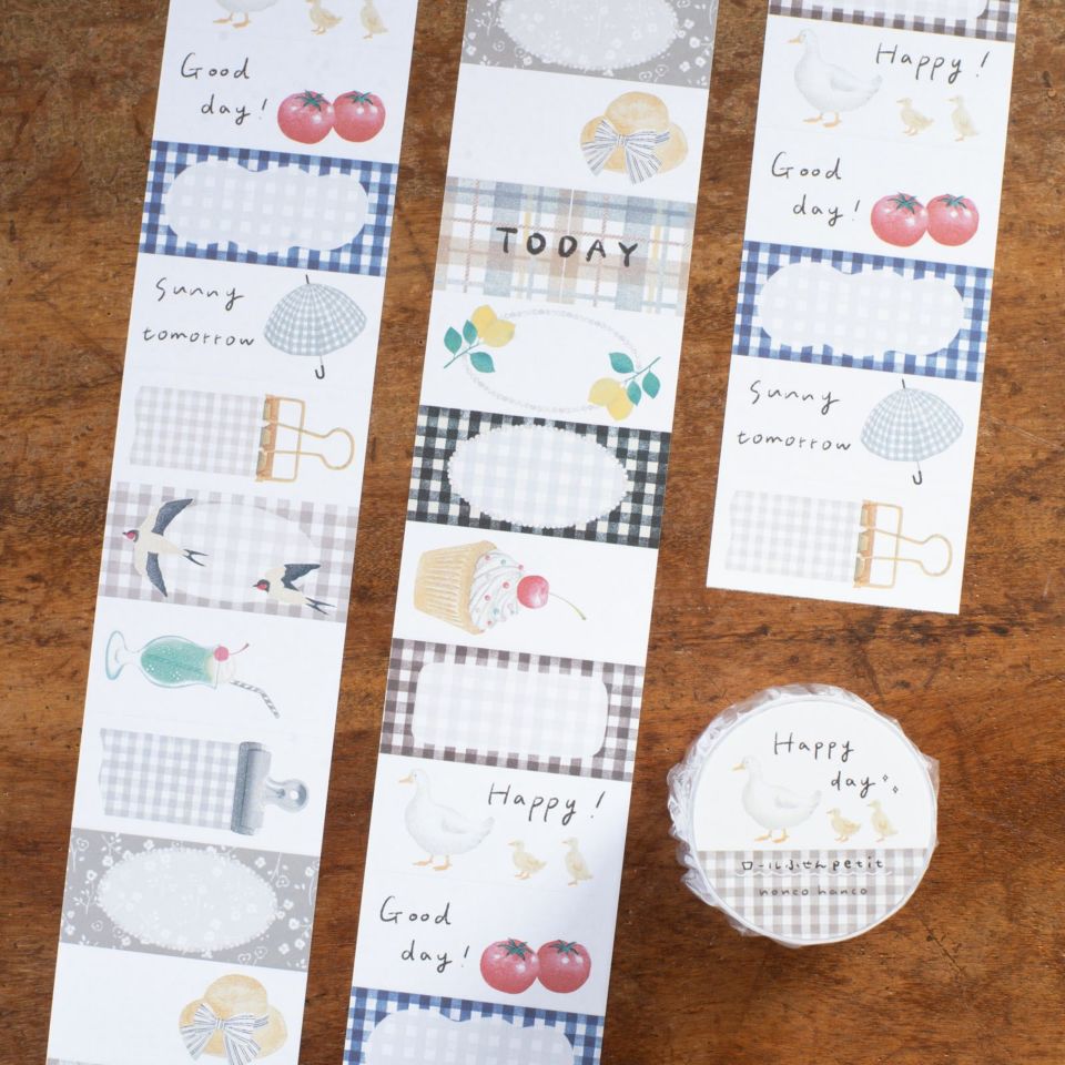 Happy Day Sticky Memo Label Sticker Tape strips with assorted designs on a wooden surface