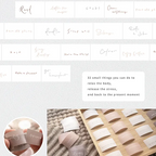 Collection of small cards with text on a textured surface