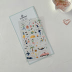 Sheet of decorative stickers with illustrations on a white surface, featuring the brand 'Suofelier'.