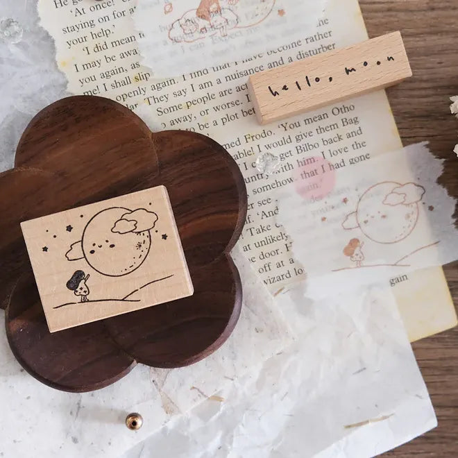 Wooden stamps with illustrations on a textured surface