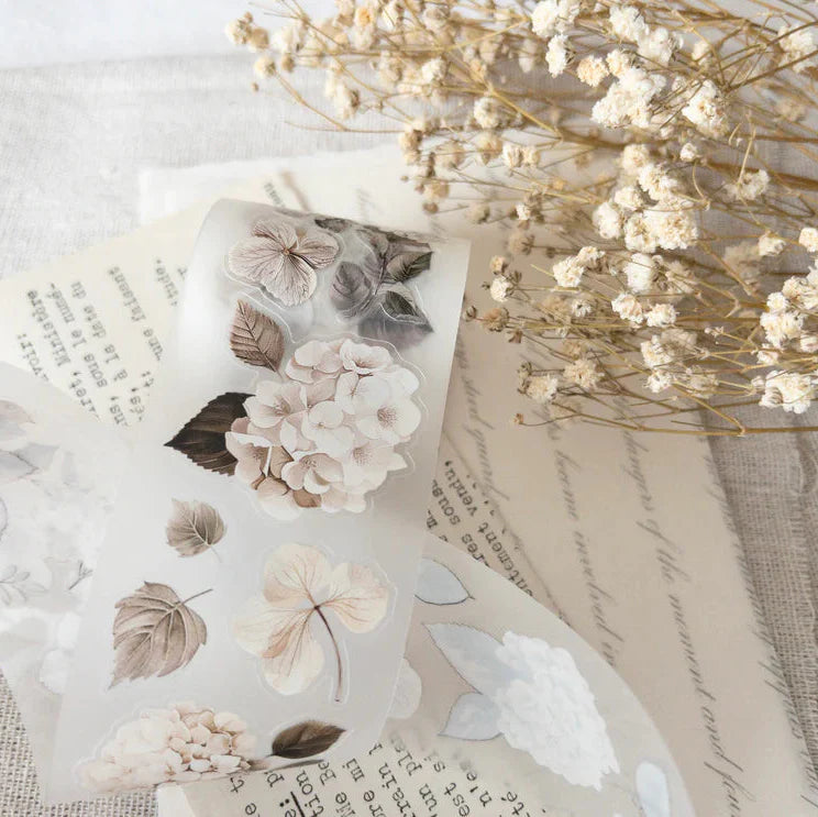 Transparent Hortensia PET Tape flower and leaf stickers styled with dried flowers on texture