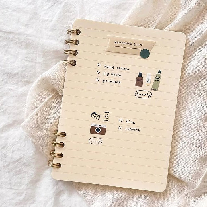 Notebook with a shopping list on a soft fabric background, from the In My Bag Sticker Sheet