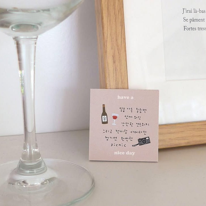 Card with picnic-themed illustrations beside a glass, from the In The Garden Sticker Sheet