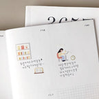 Open planner with illustrations and text on a white background