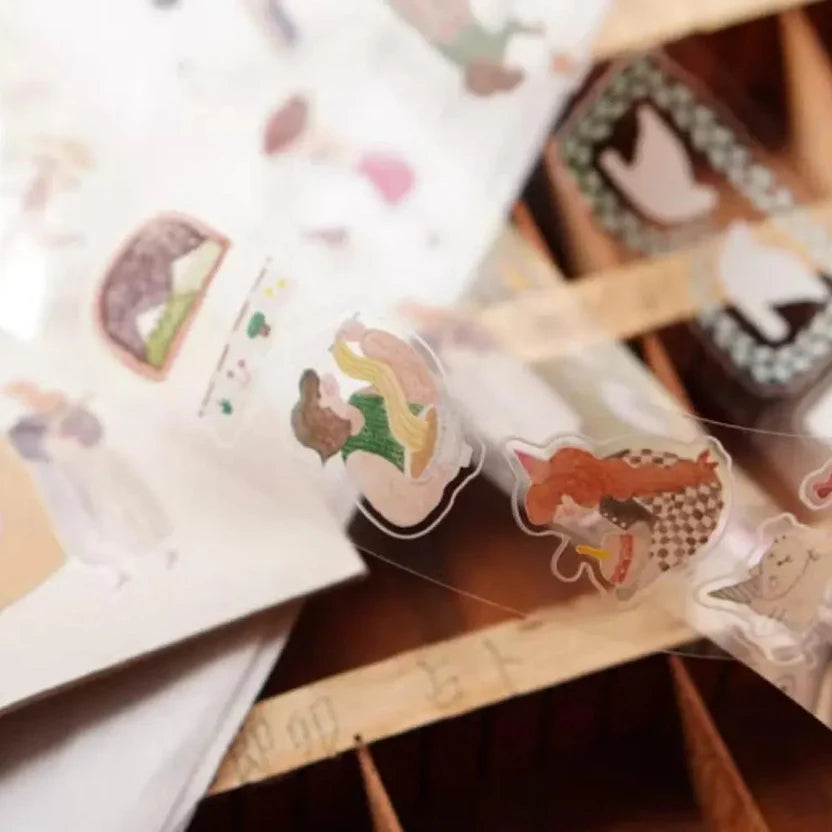 A Lovely Day PET Tape by Ivy Snow with cute animal motifs displayed on a warm wooden surface