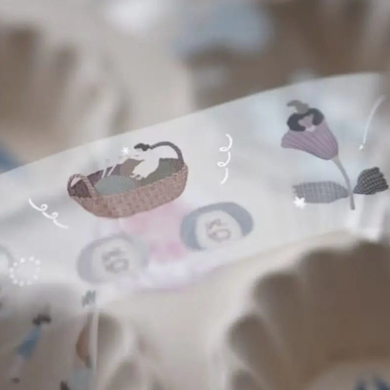 Ribbon-like strip of Girls Poetry PET Tape characters against a softly blurred background