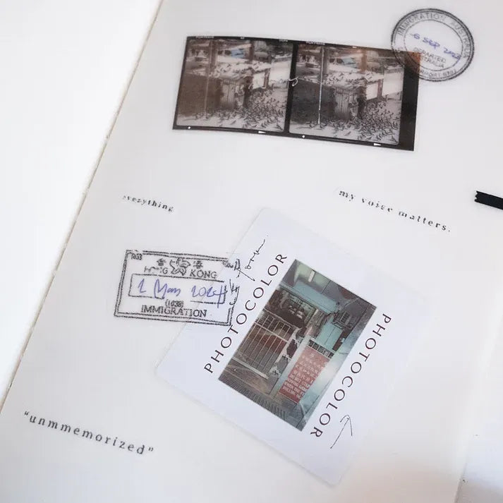 Sheet styled with Expired Visa Stamp PET Tape black and white photo and text designs, top view