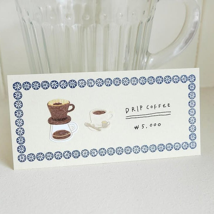 Card with a coffee-themed design and text, from the Kissaten Sticker Sheet