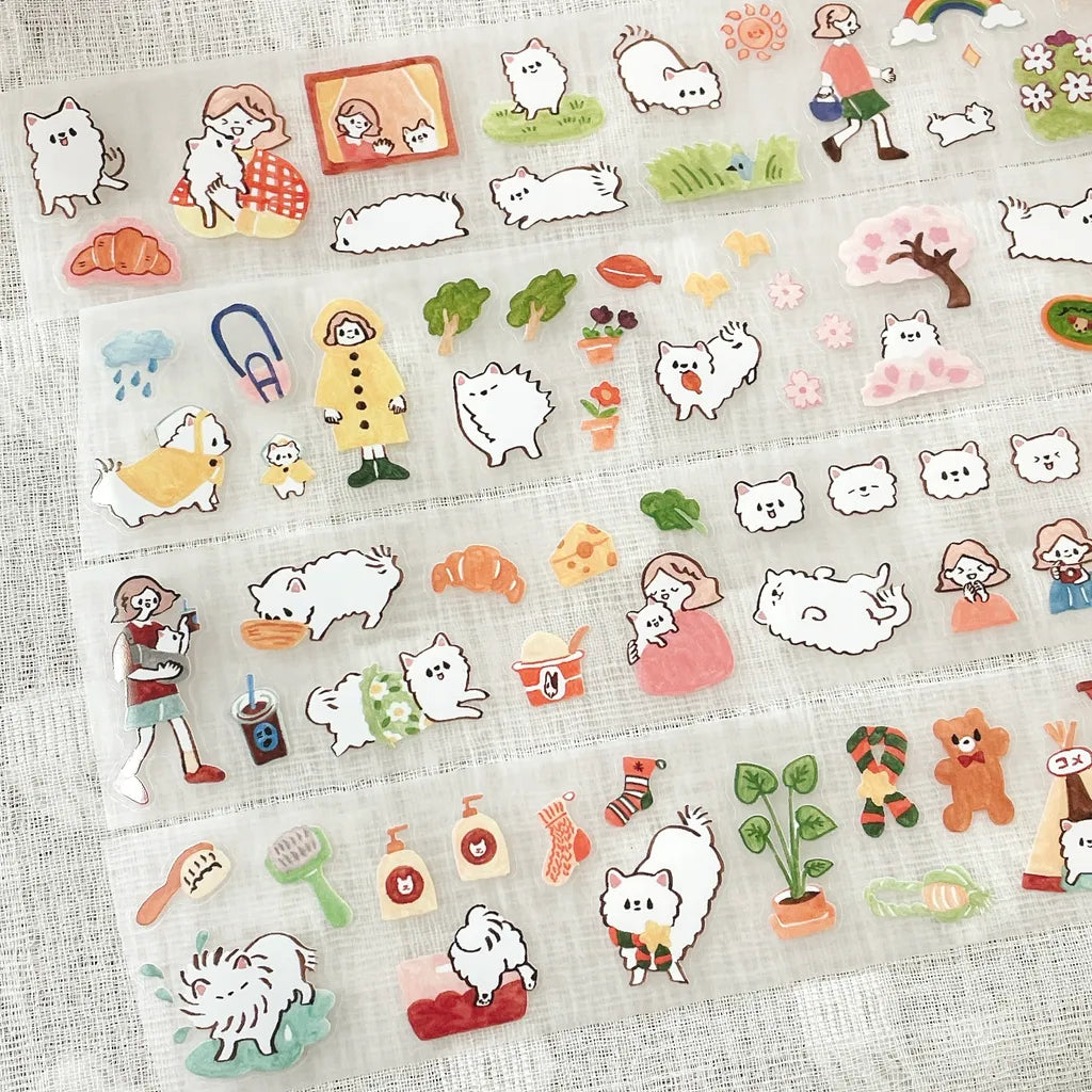 Kome-Chan Cut PET Tape kawaii sheet with dog faces, a camera and cozy lifestyle icons