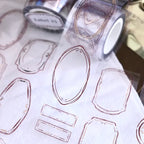 Sheet of gemstone templates with a roll of tape in the background