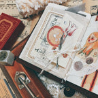 Vintage-style greeting cards with artistic designs on a textured surface with music sheets.