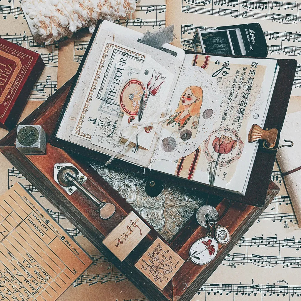 Open book styled with Lace PET Tape illustrations among music sheets and deco items
