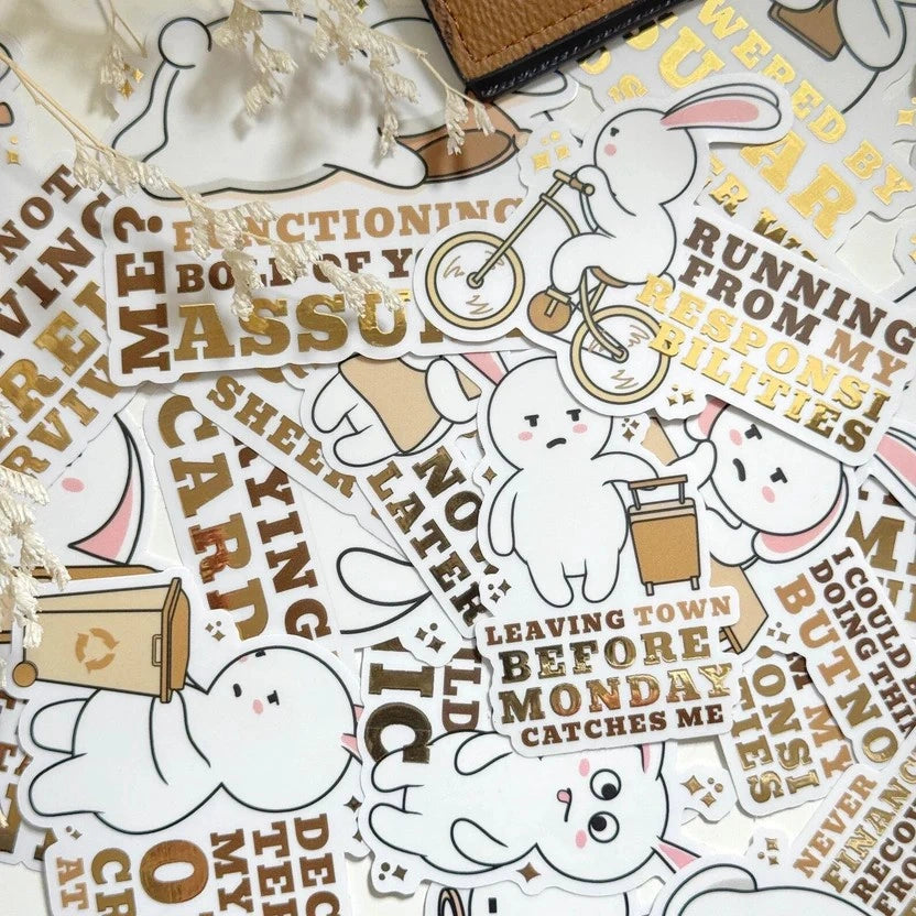 Sticker sheet with cartoon ghost characters and humorous text on a white background