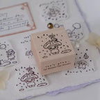 Wooden stamp with cartoon design on a white fabric background