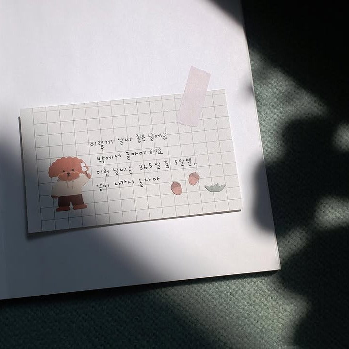 Grid notebook with cartoon characters and text, from the Let's go Camping Sticker Sheet