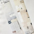 Collection of patterned paper sheets on a white background