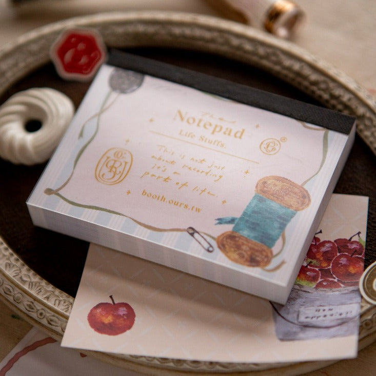 Notepad with decorative design on a textured surface