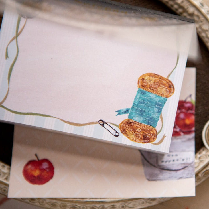 Life Stuffs Memo Pad by OURS Studio — yarn-ball memo sheet on a tray with apples, for journaling
