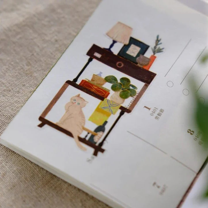 Calendar decorated with a Life With Cats PET Tape cat-and-person illustration on texture