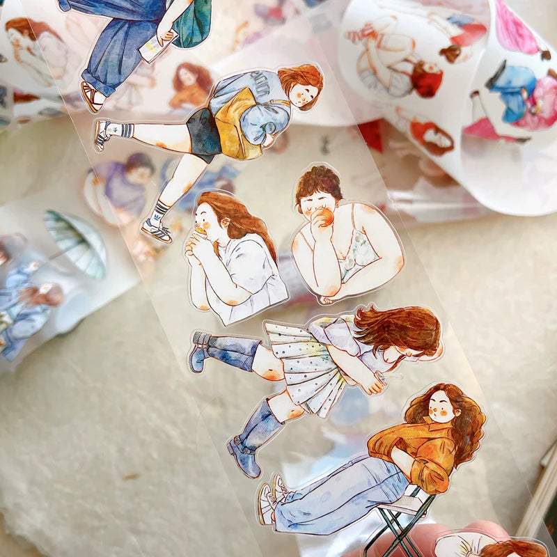 Stickers of people in various poses on a textured surface