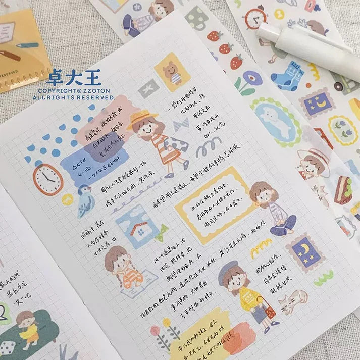 Sheet of decorative stickers with cartoon characters and text on a textured surface