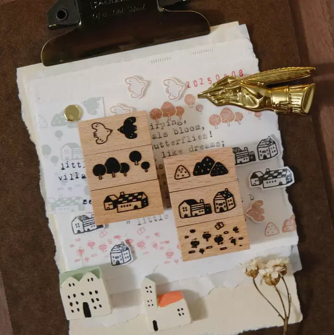 Little Village Rubber Stamps Set B with cozy village building designs displayed on paper