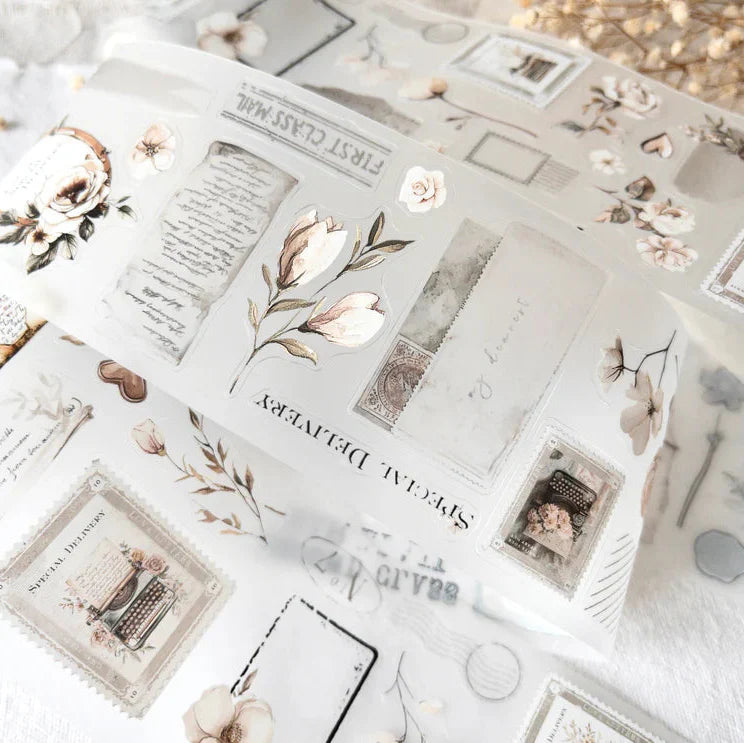 Decorative book styled with Love Letters PET Tape floral vintage designs on a clean white surface