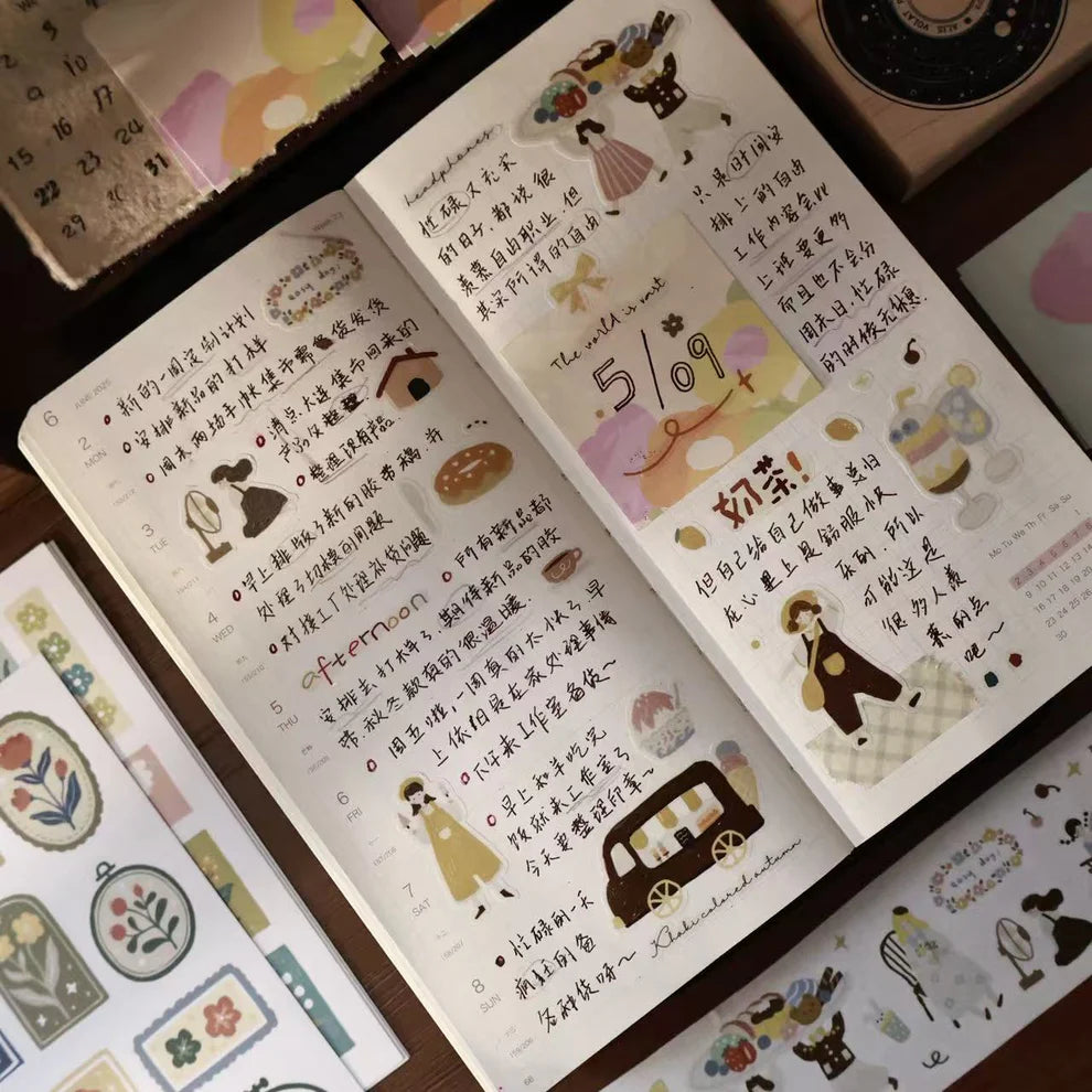 Open notebook decorated with Macaron Afternoon PET Tape illustrations on a wooden surface