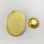 Gold metal magnetic backing pieces showing textured plate and round magnet component for planner charm