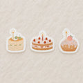 Set of three aesthetic birthday cake memo pads featuring cherry cake, strawberry cake, and donut cake designs in pastel tones