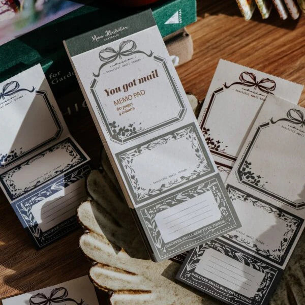 You Got Mail Memo Pad shown in its decorative retail packaging displayed on a wooden surface