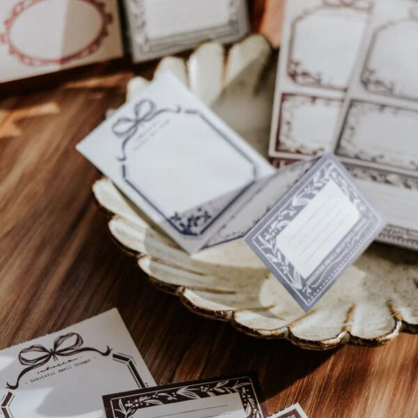You Got Mail Memo Pad decorative sheets laid out on a warm wooden surface, top view