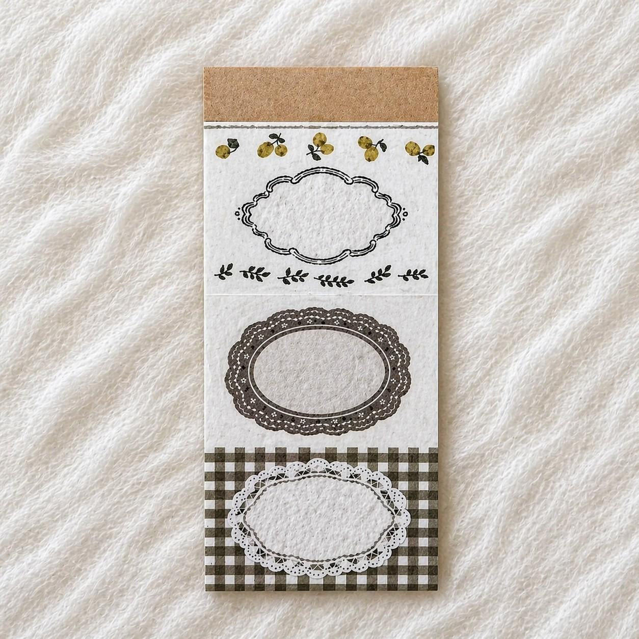 Lemon Memo Pad by Pion with printed frame designs on perforated sheets on textured white