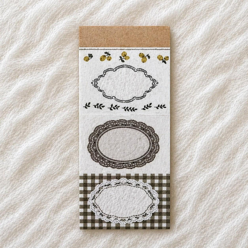 Lemon Memo Pad by Pion with printed frame designs on perforated sheets on textured white